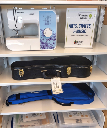 Arts Crafts and music eureka section with sewing machine and ukulele